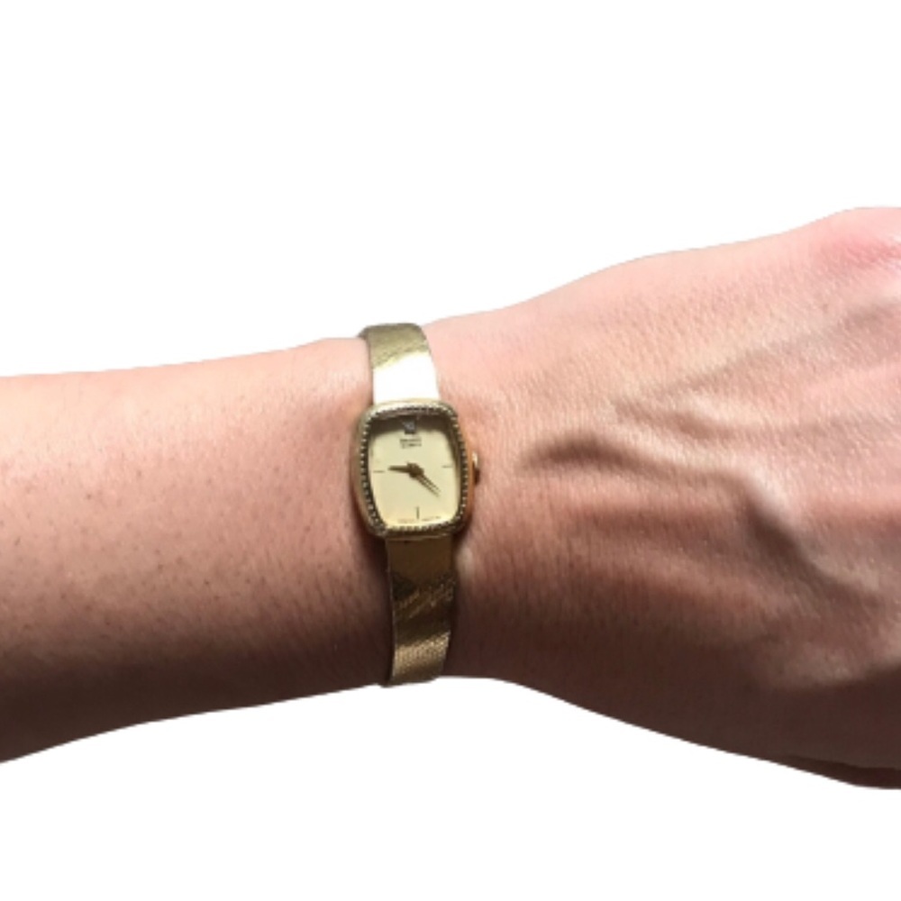 Vintage gold crystal Seiko watch women’s dainty
Princess Diana style bevel